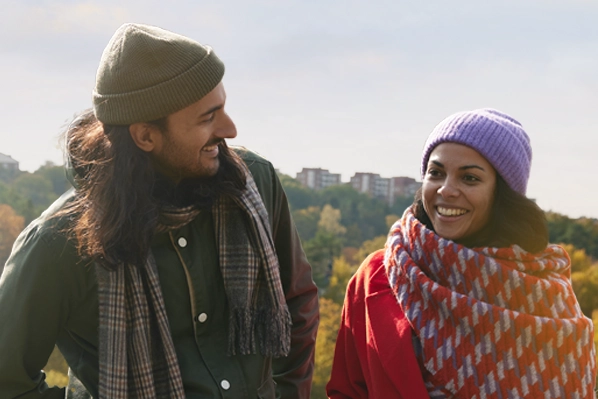 two friends chatting on a walk